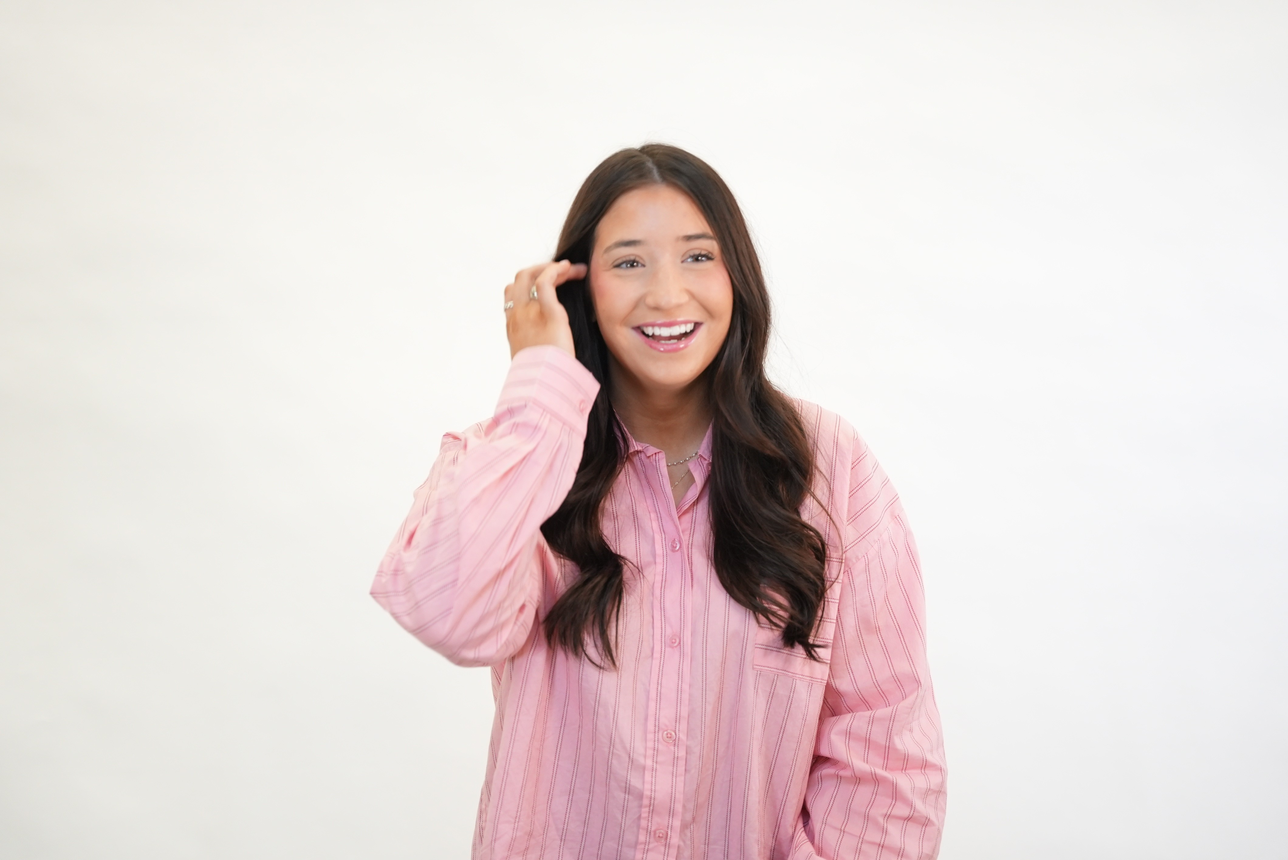 a blurry photo of a person standing in front of a wall