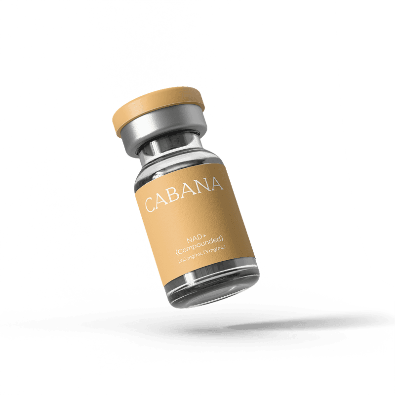 Cabana NAD+ Compounded injectable vial close-up, 100mg/mL, with gold label on dark background