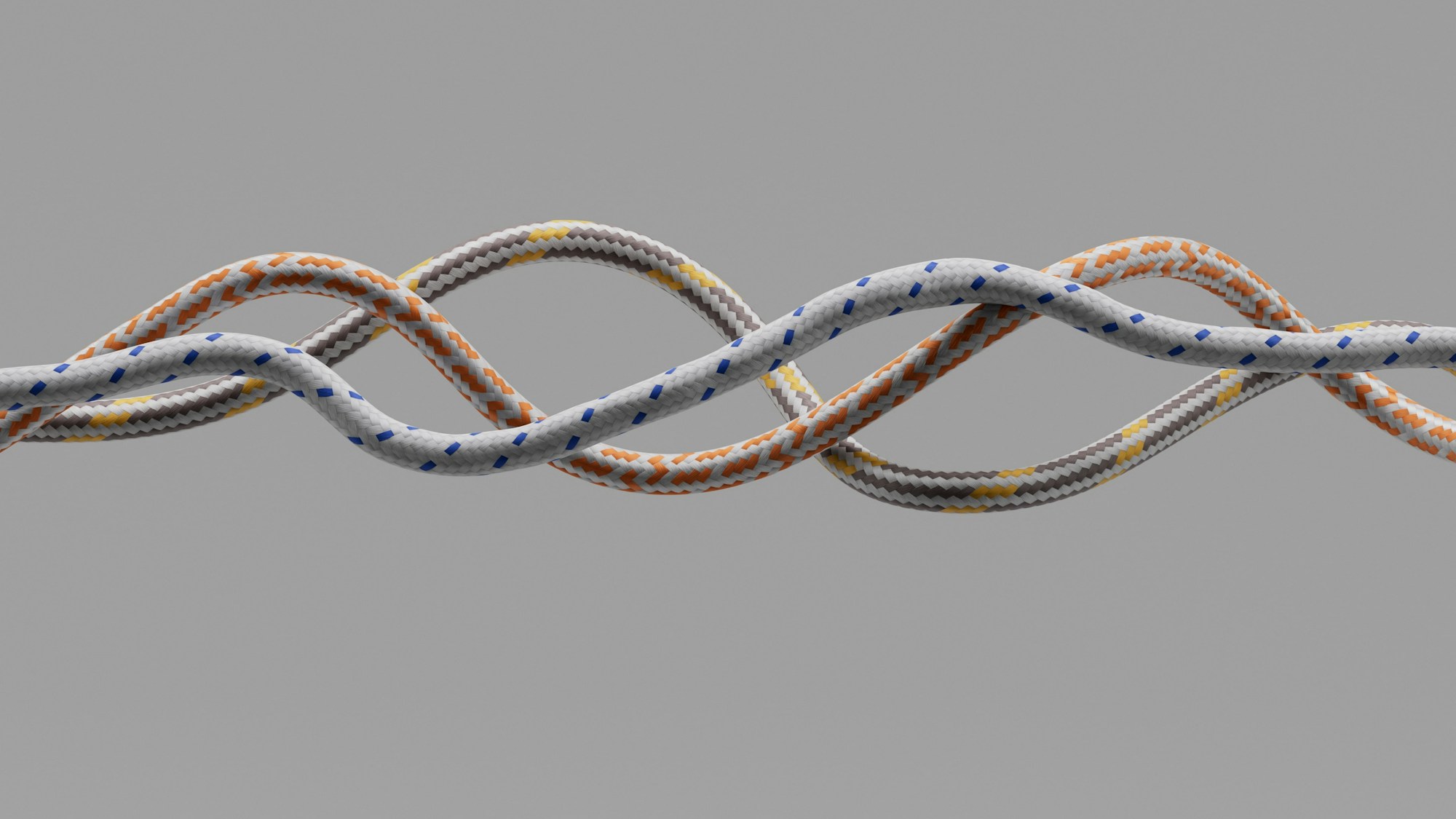 Two braided cables twisting together on a grey background