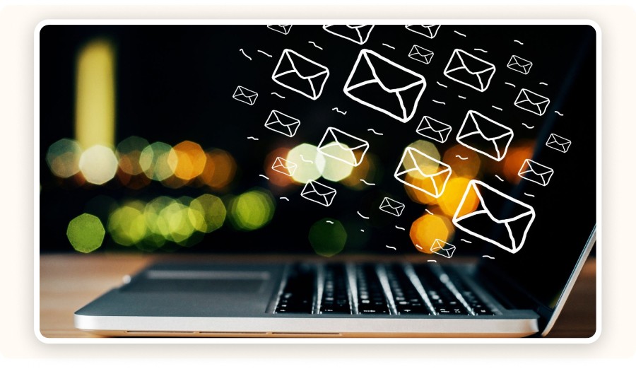 Laptop with email icons