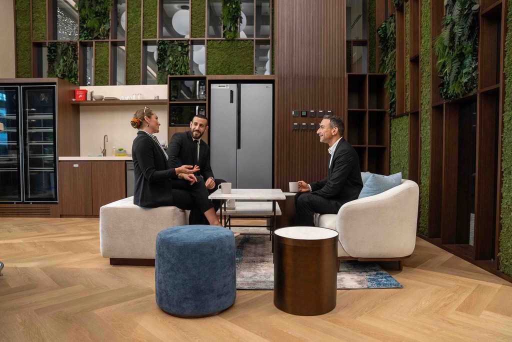 Modern executive meeting room in Dubai Marina with a large screen and conference table