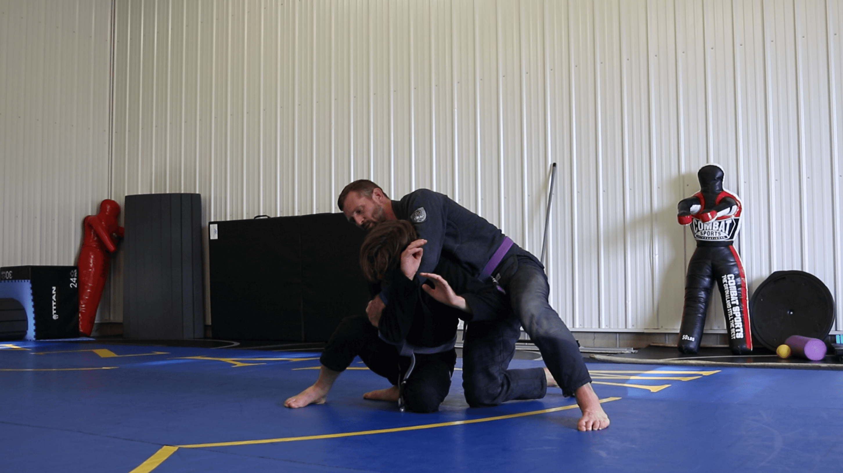 Cross face cradle to take the back in jiu jitsu