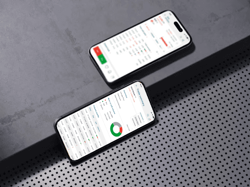 two cell phones on a gray surface