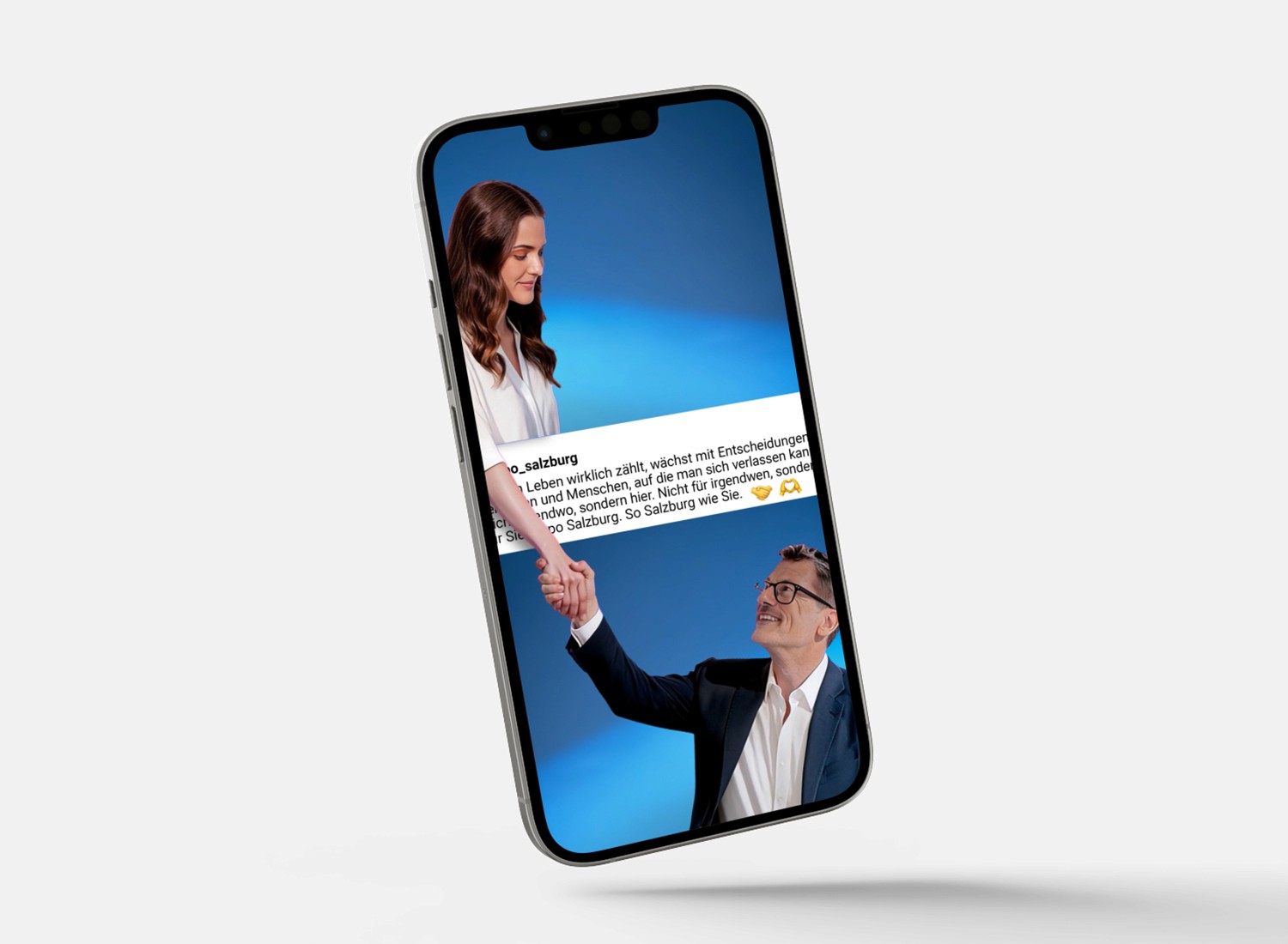 Handy auf dem eine Social Media Werbung zu sehen ist, wo sieh zwei Personen die Hand reichen.