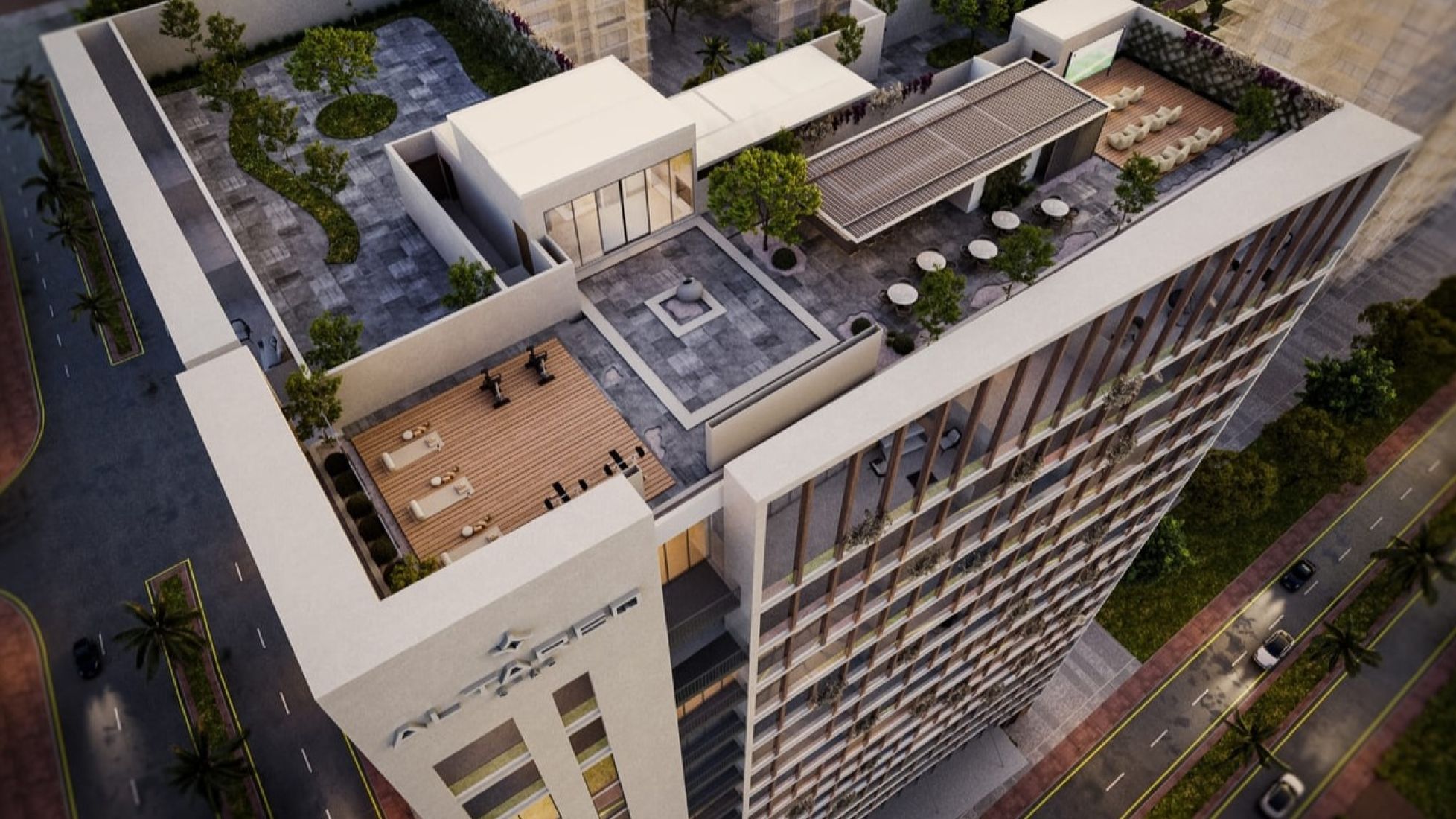 Al-Tareq Star Development illuminated at night, showcasing its architectural features against a dark sky.
