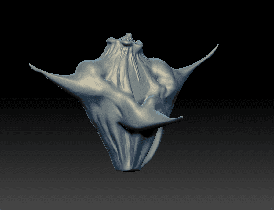 Angular flower-like sculpt with pointed lateral forms and a hanging central structure.
