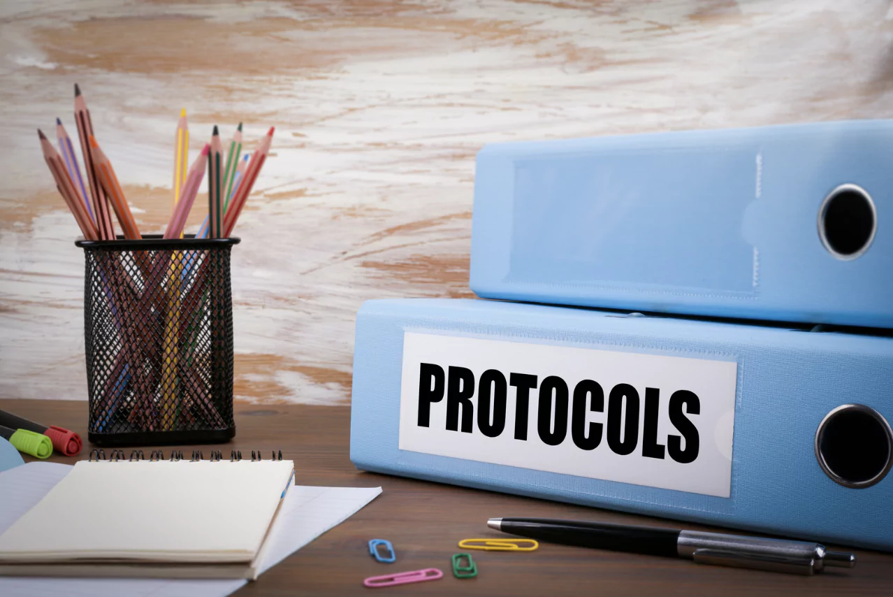 A blue folder with protocols