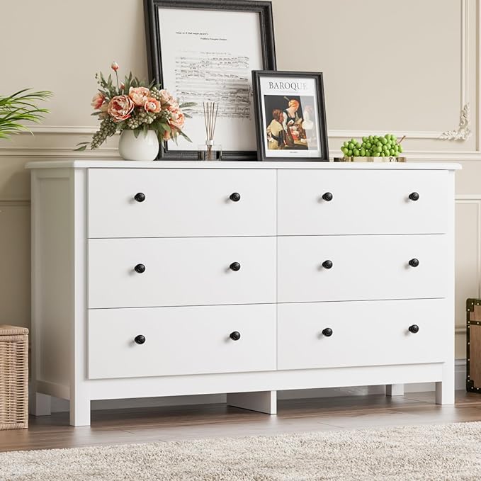 White dresser with black handles – A stylish and functional furniture piece, perfect for any modern home.