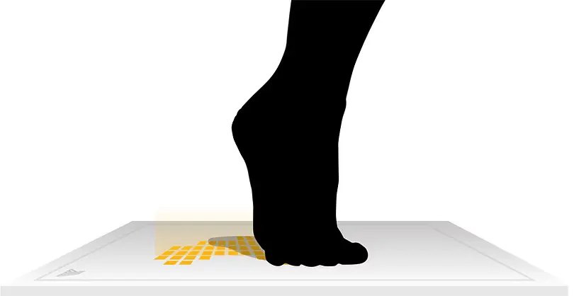 Foot walking on Footscan pressure plate for gait and pressure analysis, supporting custom 3D-printed insoles and orthotics for foot pain, plantar fasciitis, flat feet, high arches, and Morton's neuroma at Limitless Orthotics clinic, Leeds.