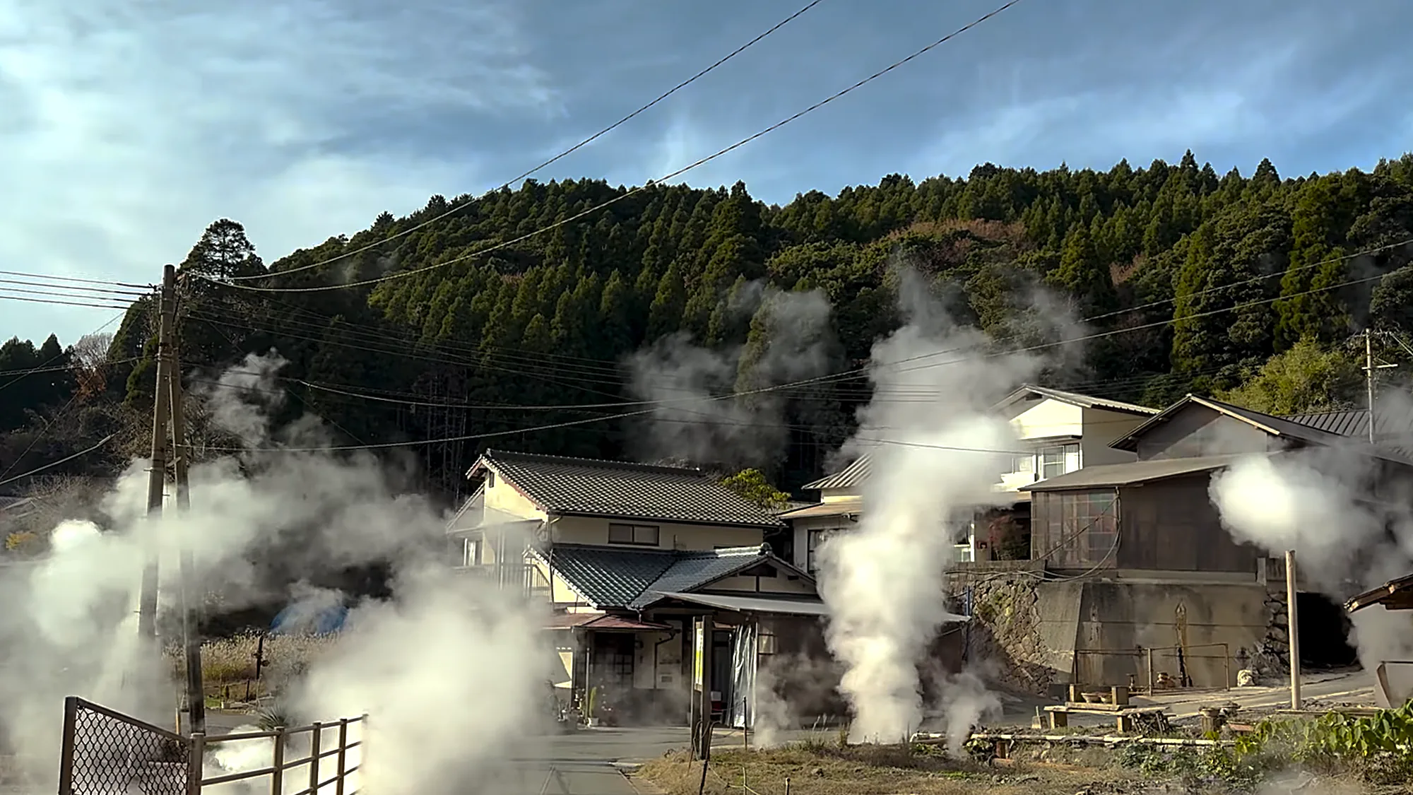 Geothermal steam rising through the village at Waita, near Kurokawa Onsen