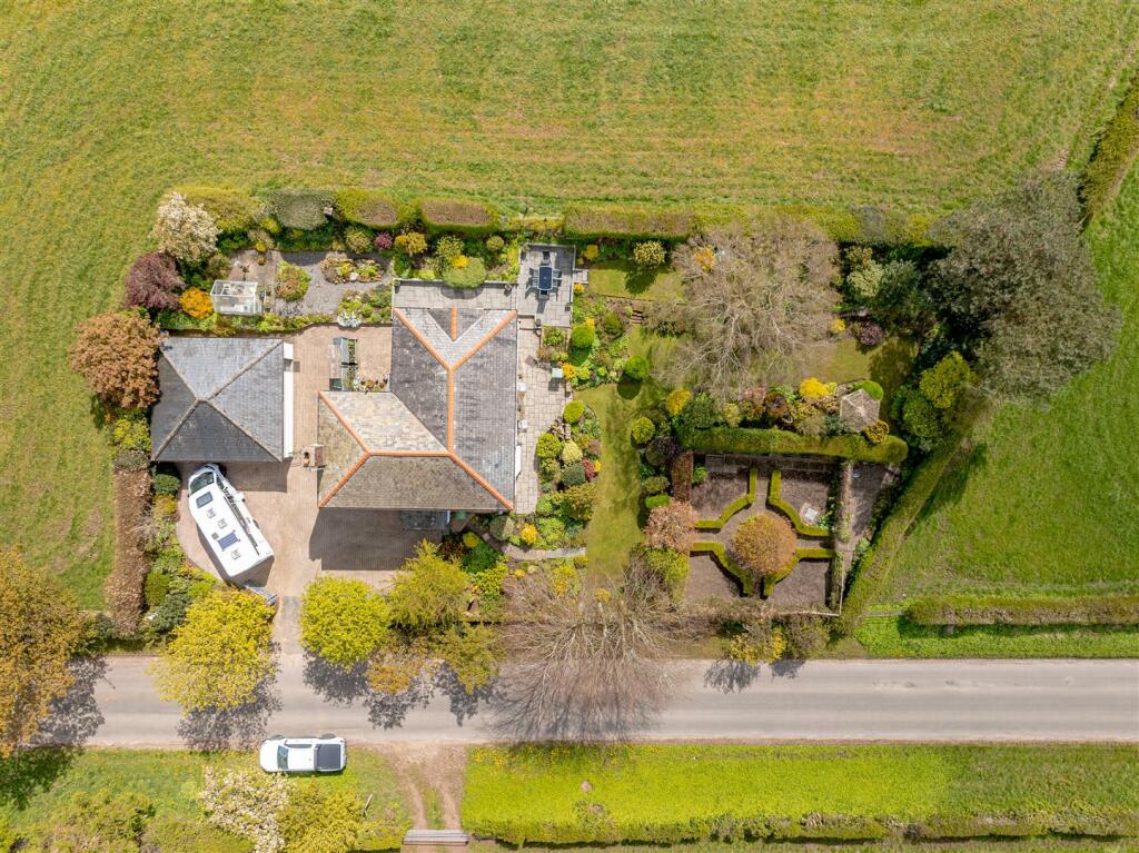 sunlit empty room with wooden floors