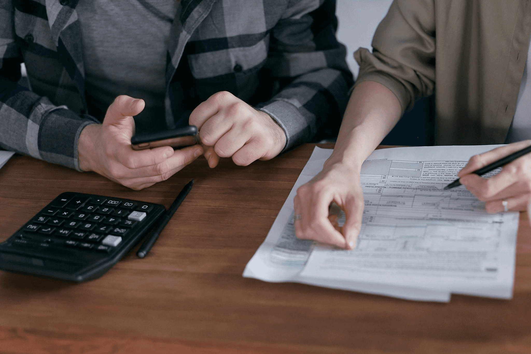 A property owner is navigating the cost benefits of a commercial snow removal contract.