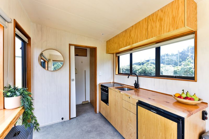 Tiny By Taylor Kitchen layout - Photo by Living Big In A Tiny House