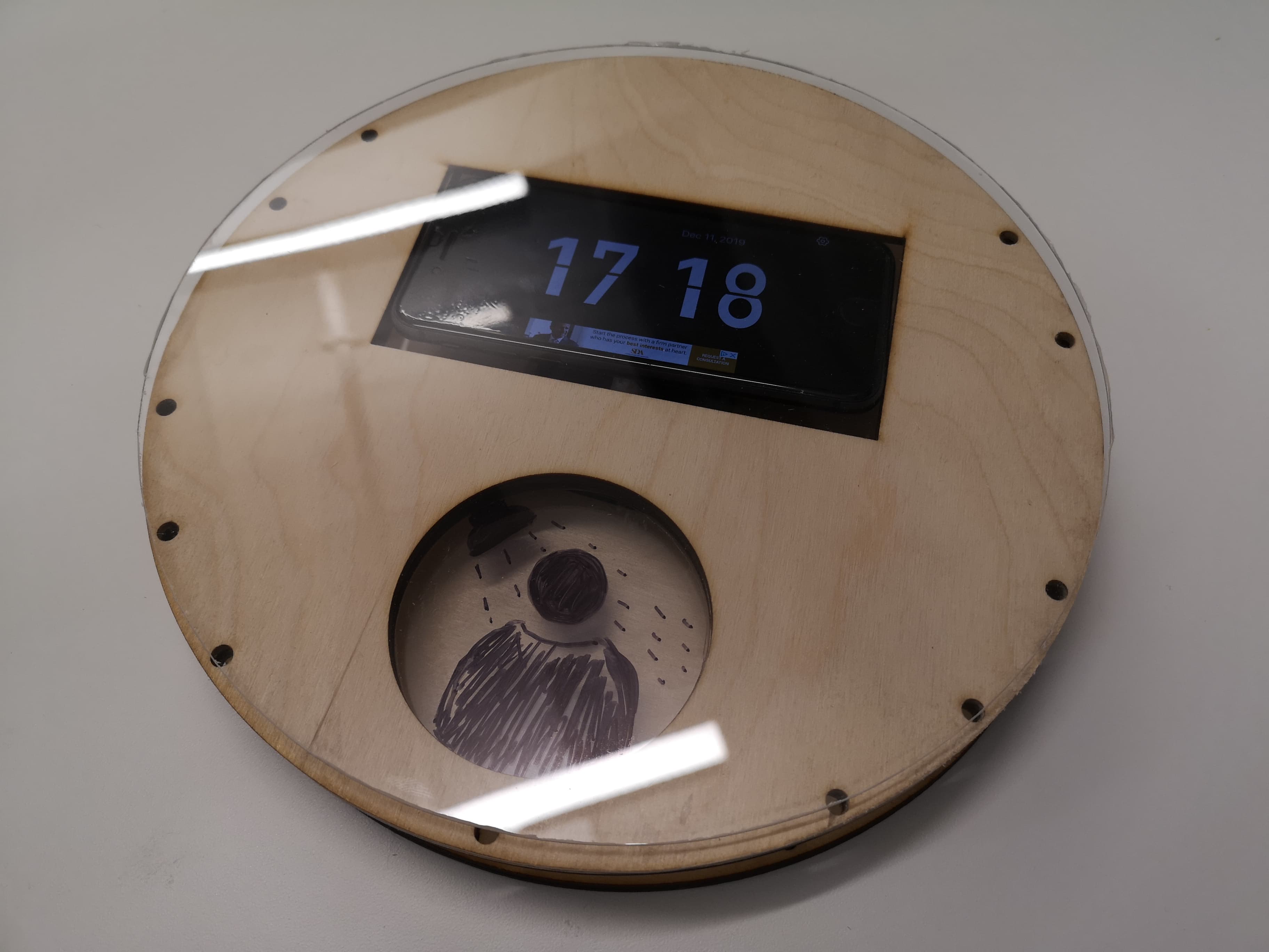 Modern home office setup with a monitor, ergonomic chair, keyboard, and indoor plants near a window with blinds.