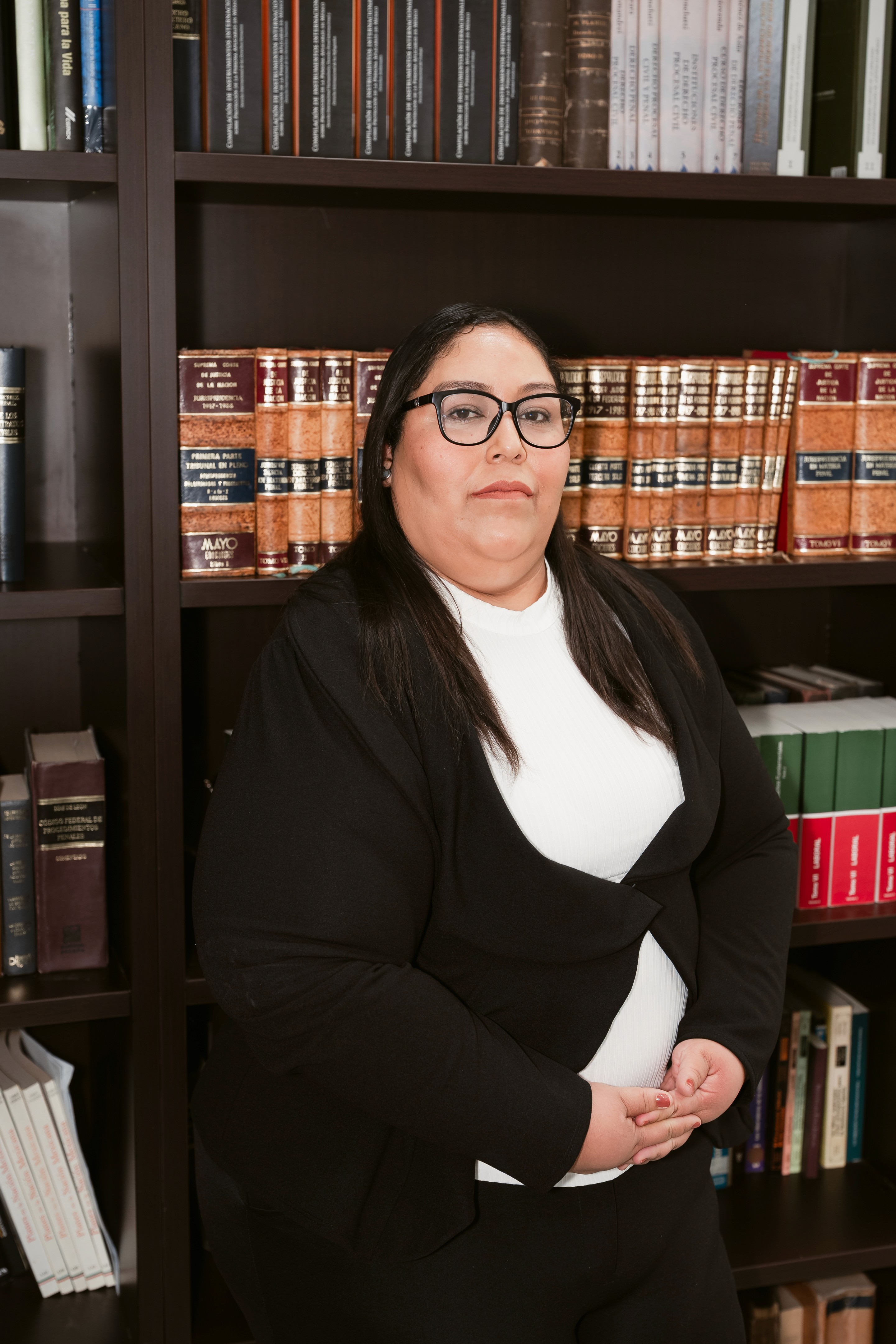 a woman in a black suit