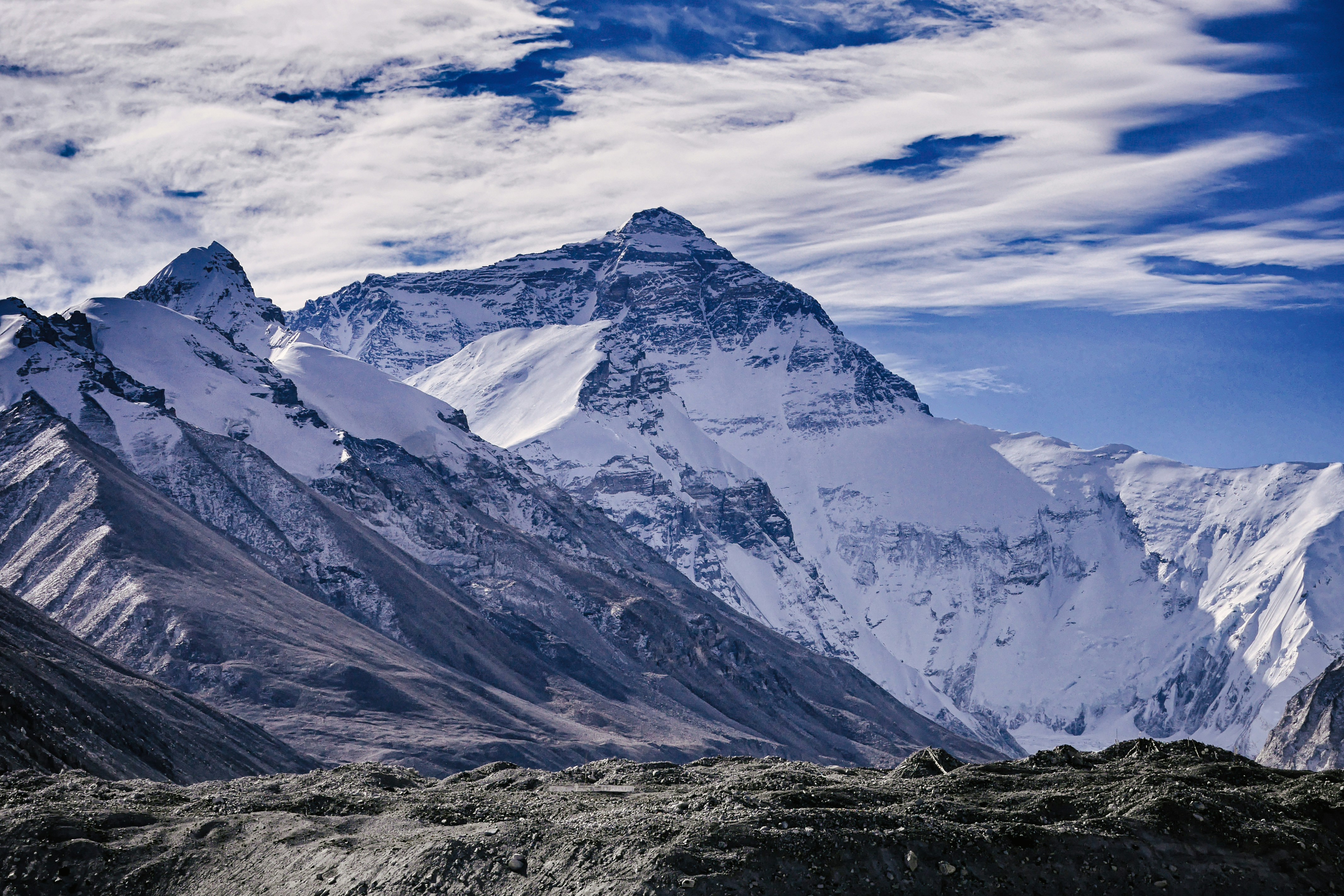 snow covered mountains under blue sky during daytime