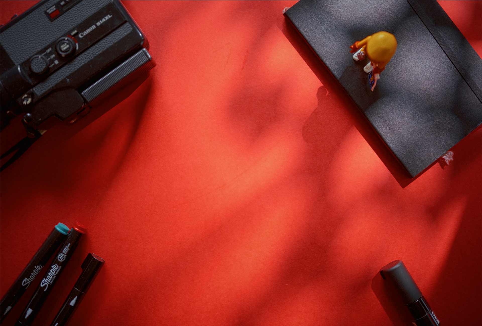 Flatlay image on red background