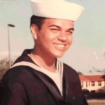 Portrait of Larry Starbird, a smiling man in a U.S. Navy uniform