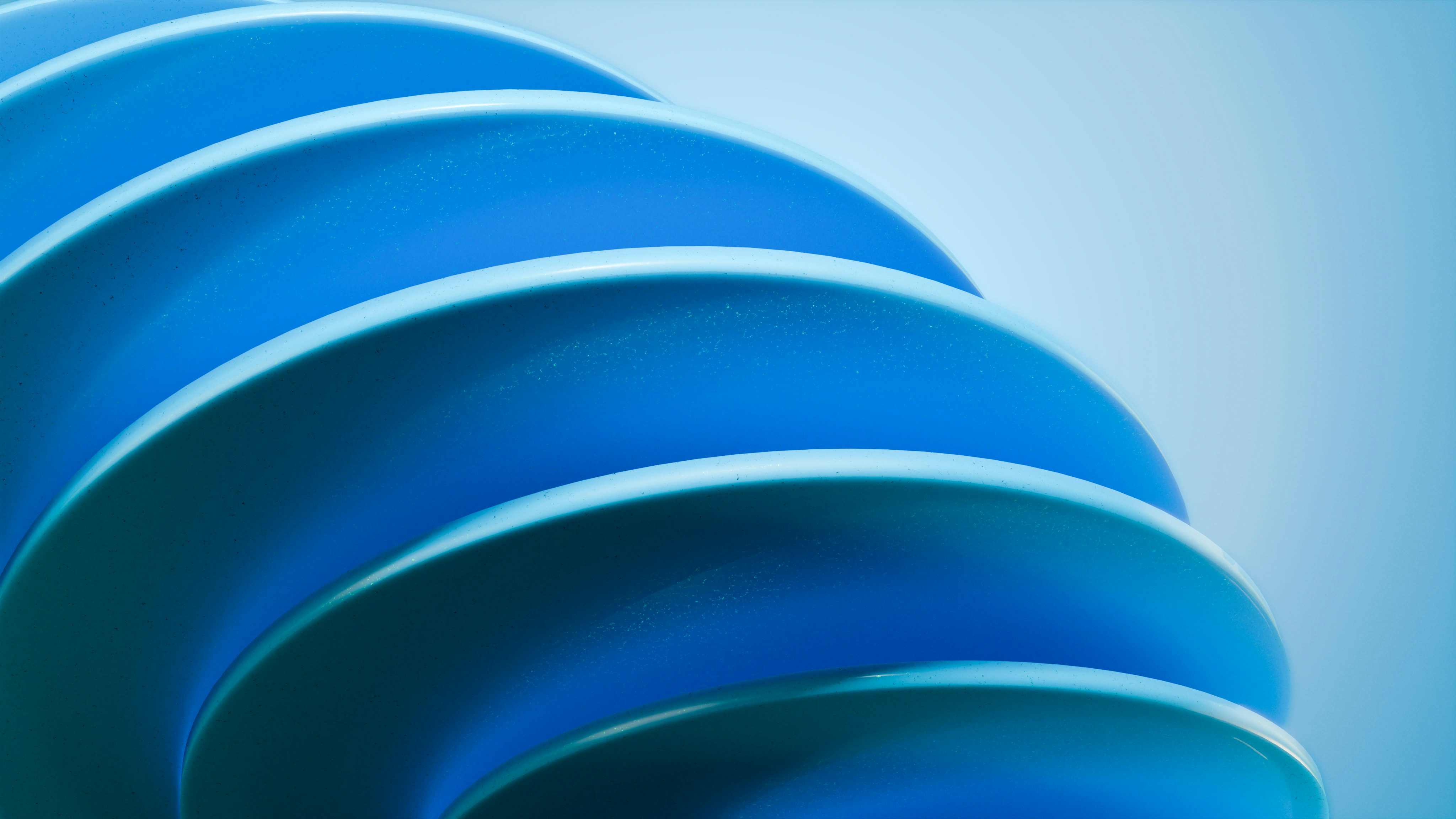 A close up of a blue object with a blurry background
