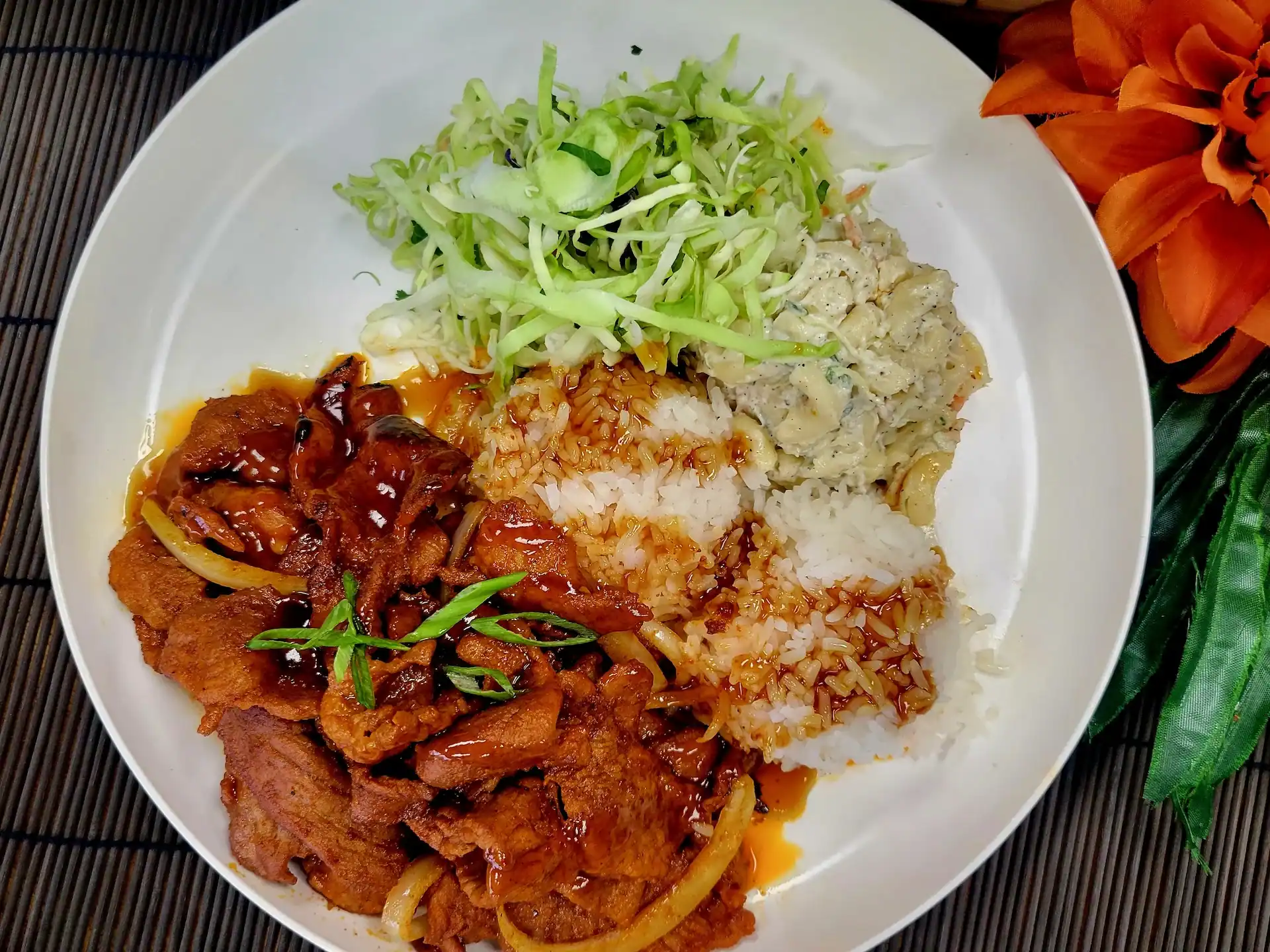 Flame-grilled Spicy Pork marinated in Korean-inspired BBQ sauce