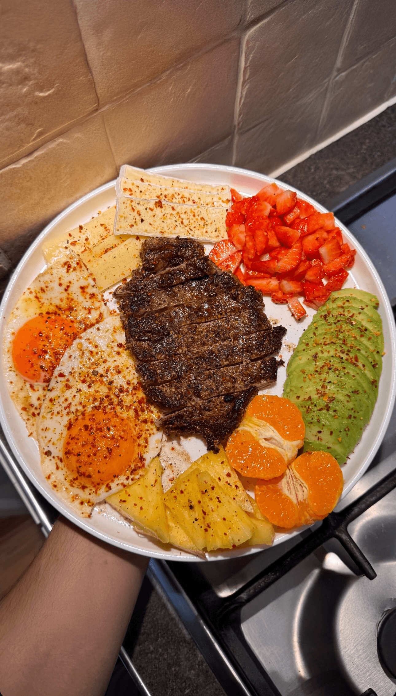 people in a large building with Tate Modern in the background