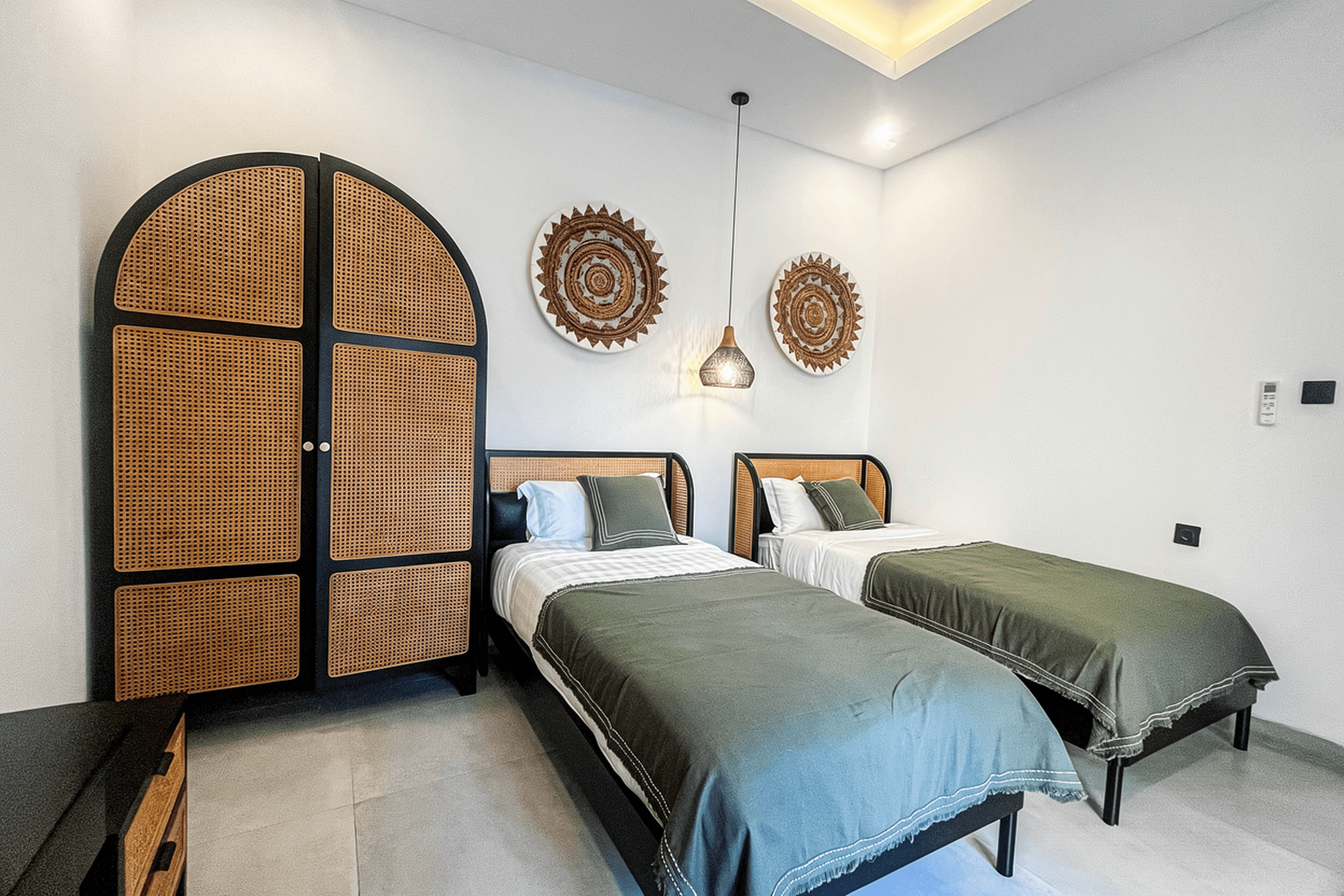 Mediterranean-style balcony with arches in Jimbaran. Expert real estate services for luxury Bali properties.