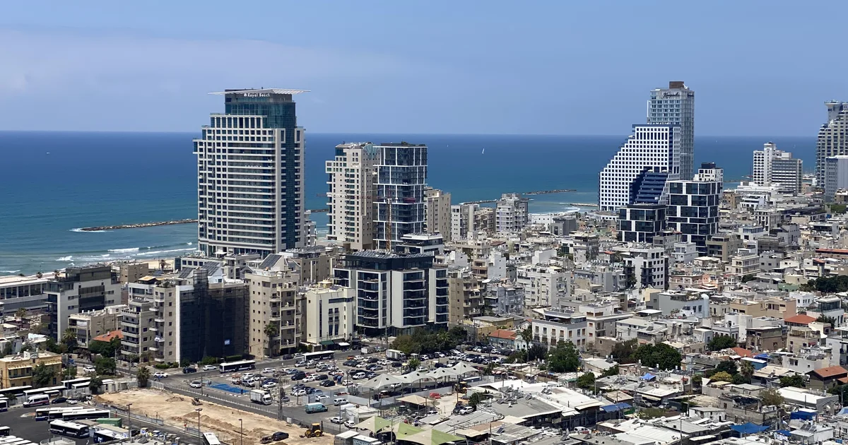 Tel Aviv skyline with beachfront hotel and residential towers and the Mediterranean Sea