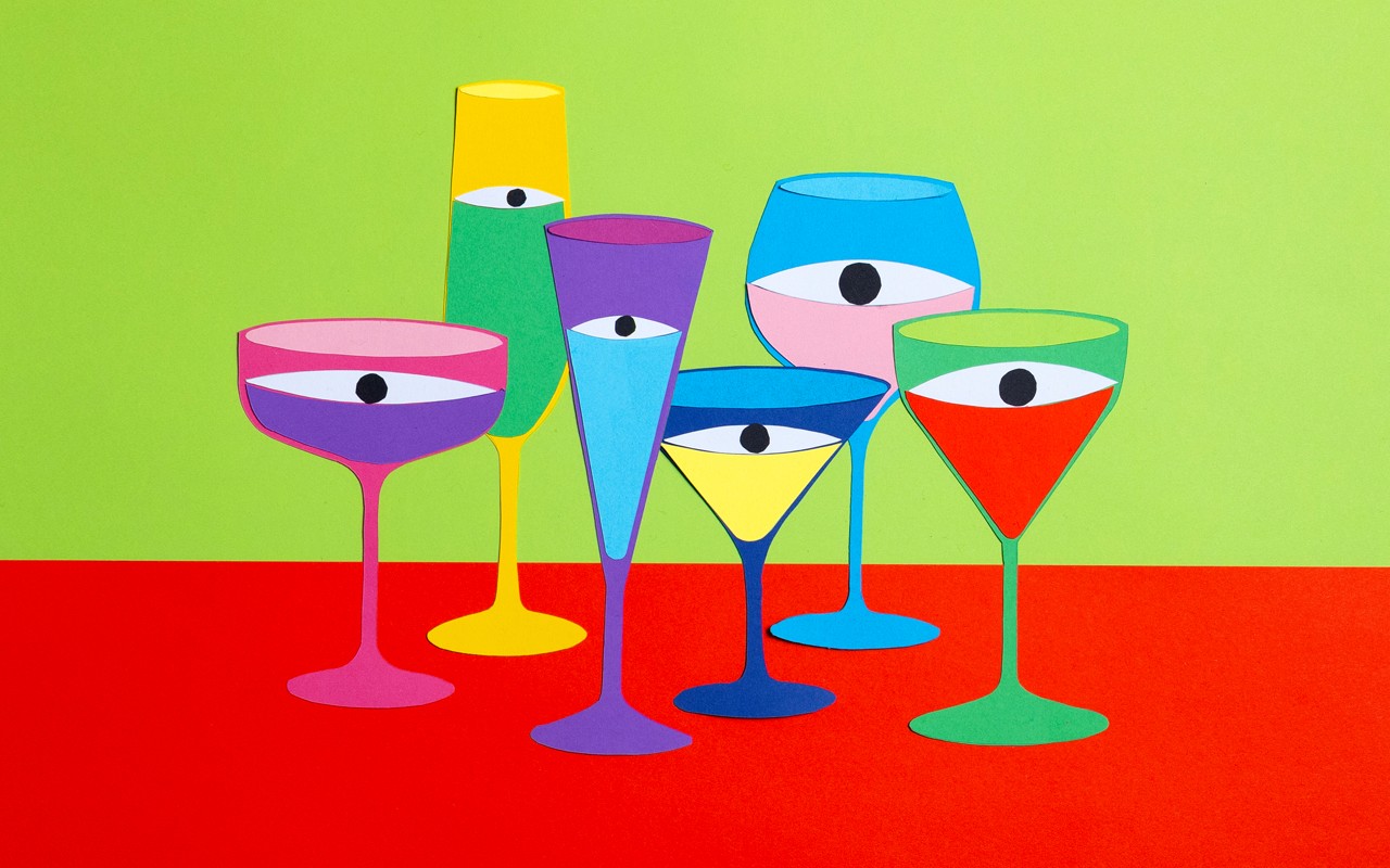 Vibrant green Northern Lights dancing over a tiered waterfall in Iceland at night. Photo by Witness.