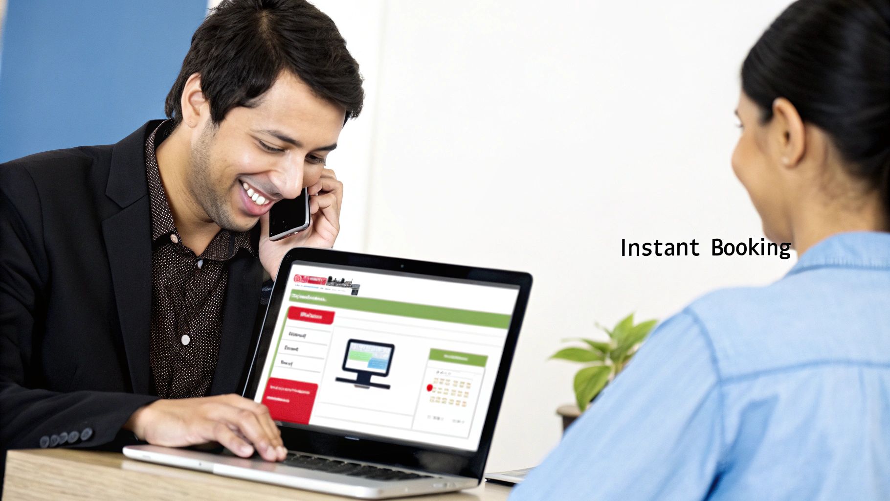 A smiling man talks on the phone while using a laptop for instant booking, with a woman opposite.
