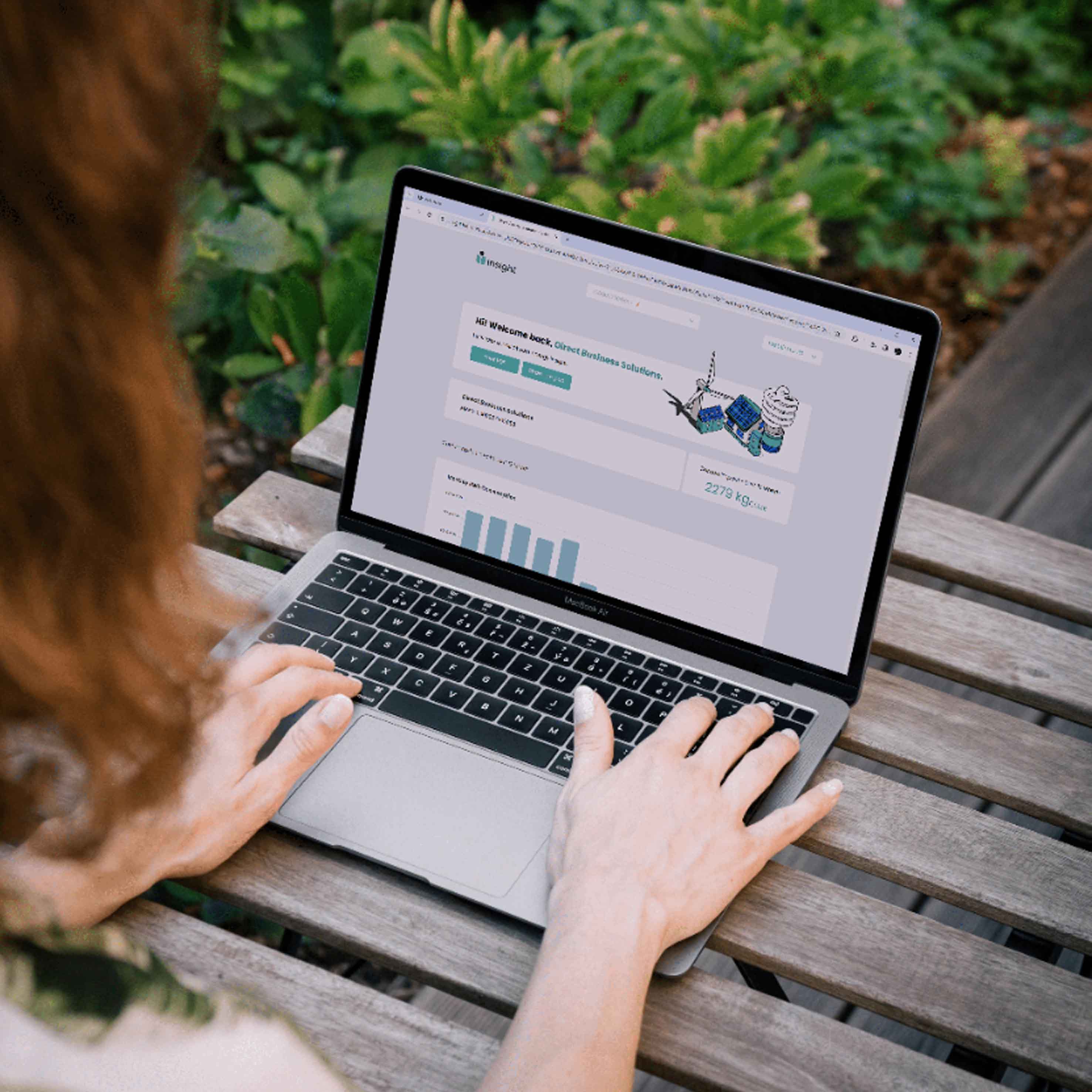 Woman at a wooden table using the Insight tool