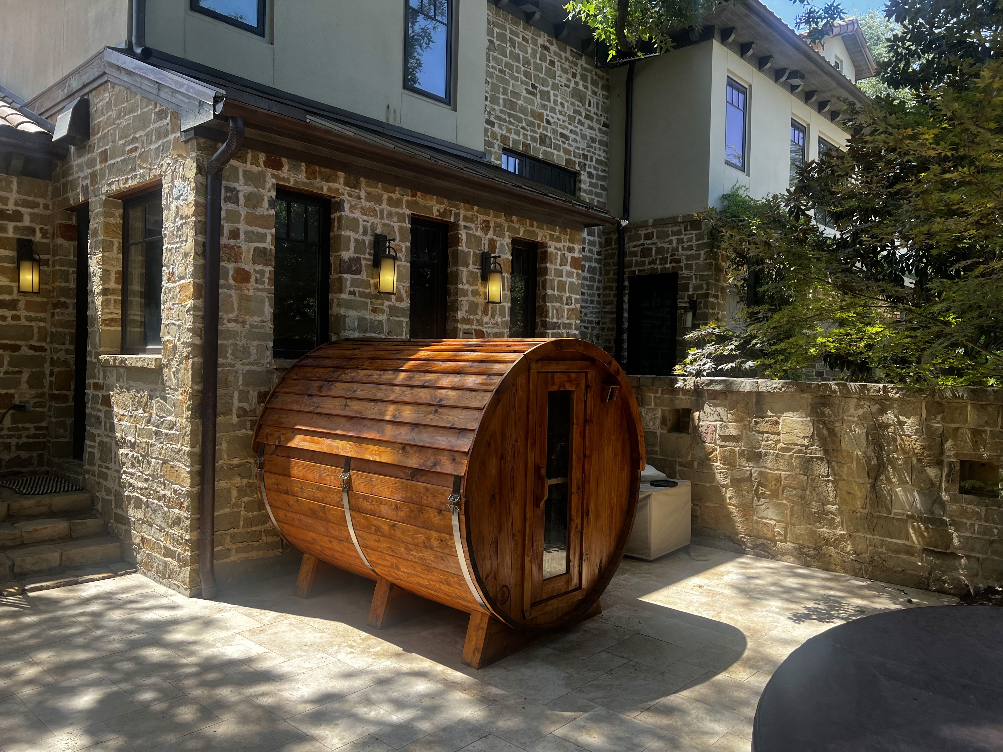 Restored warm cedar fence after Scandinavian wood preservation