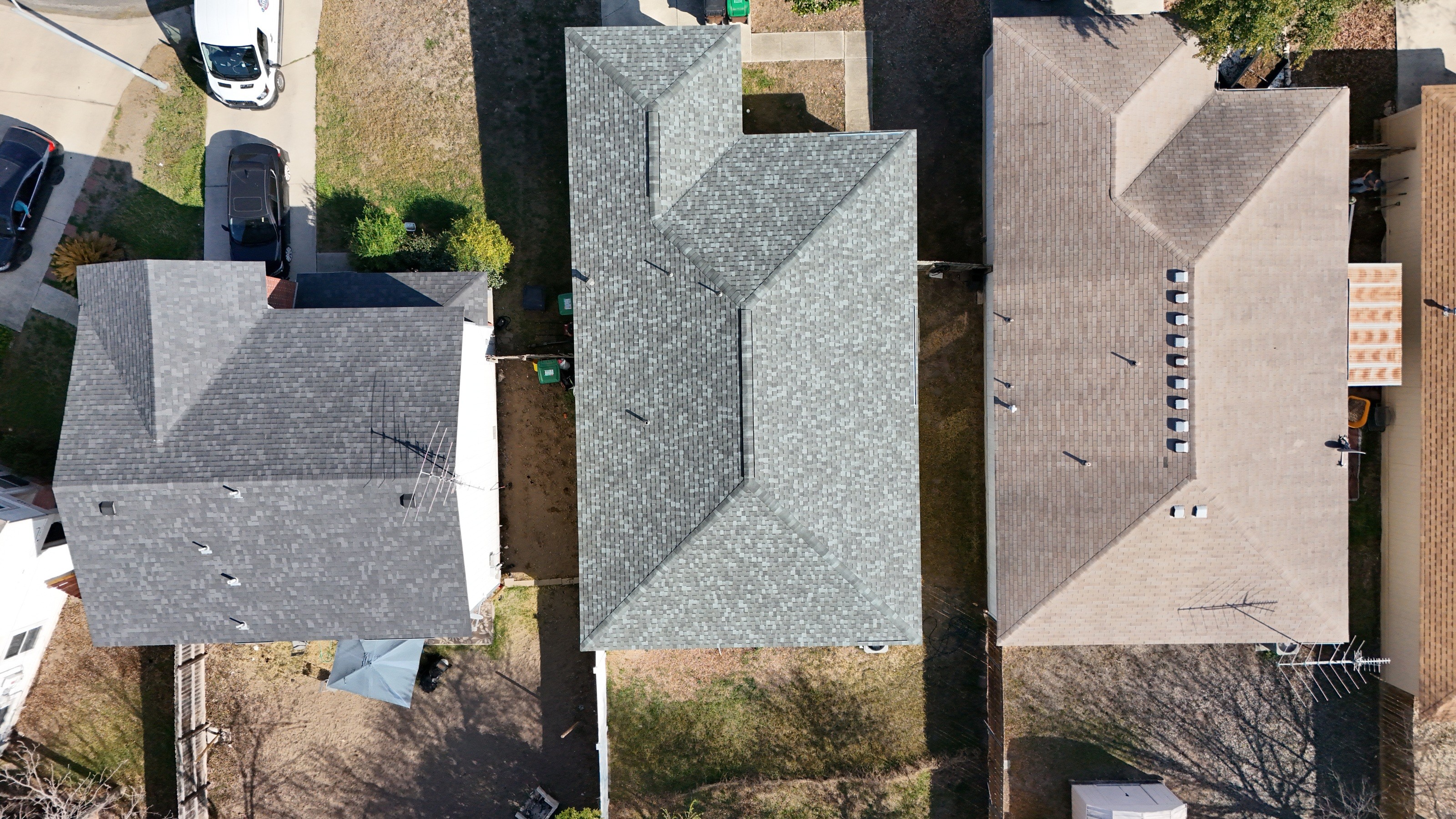 Aerial view of our San Antonio roof replacement with Atlas shingles in Coastal Granite.