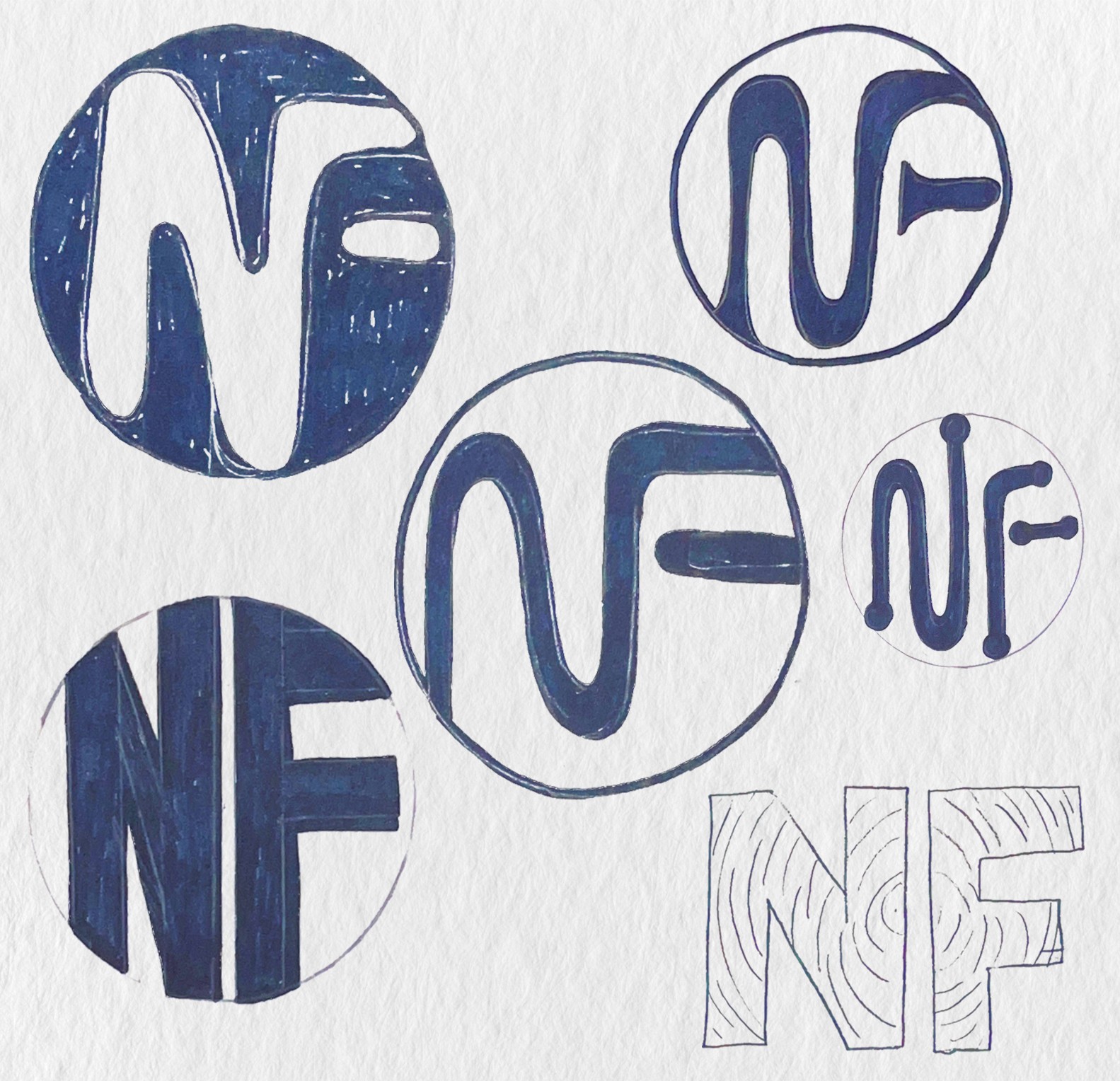 Sketches of Nextfuge logos. Pen on paper