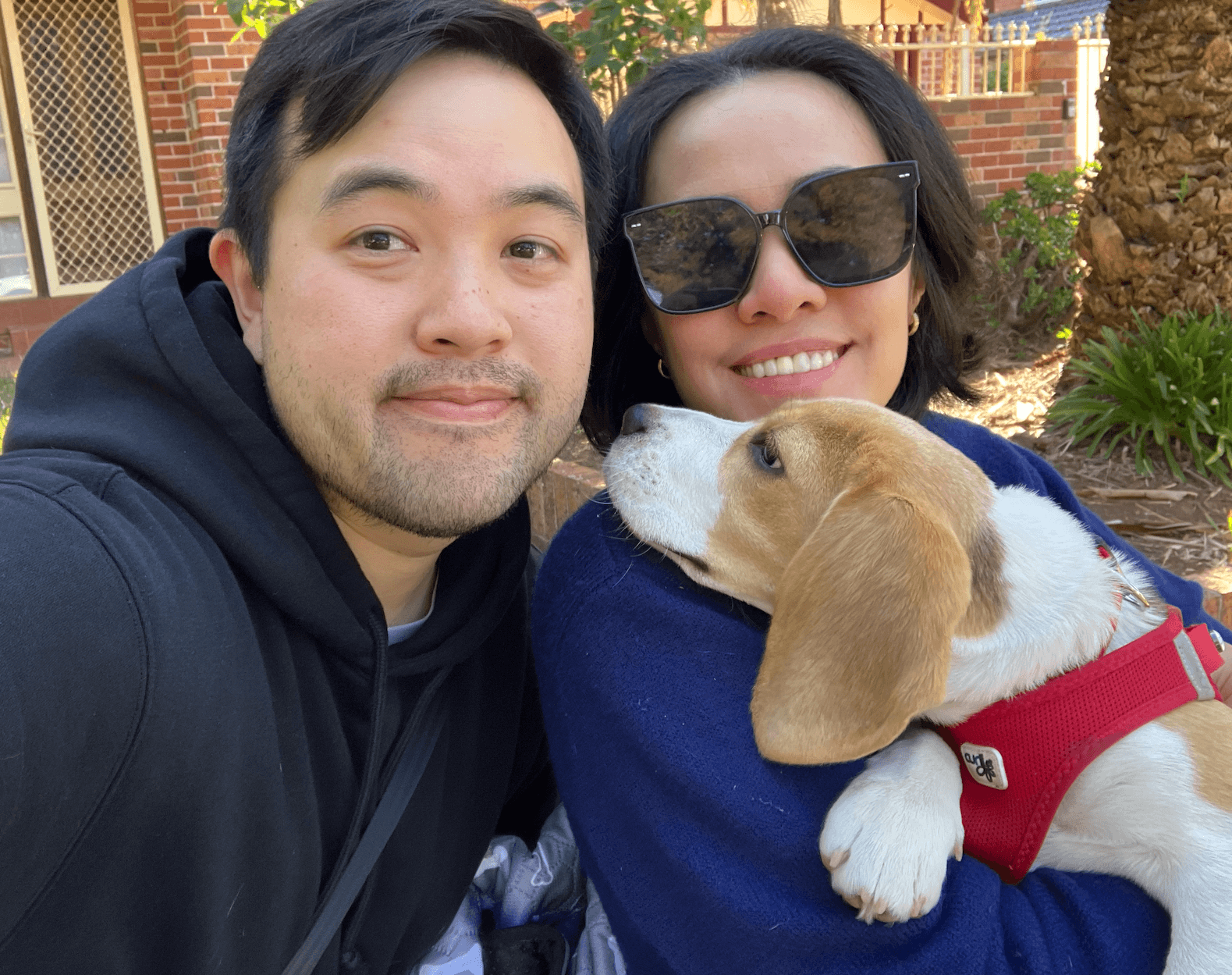 Ron with his wife and their beagle, Bagel