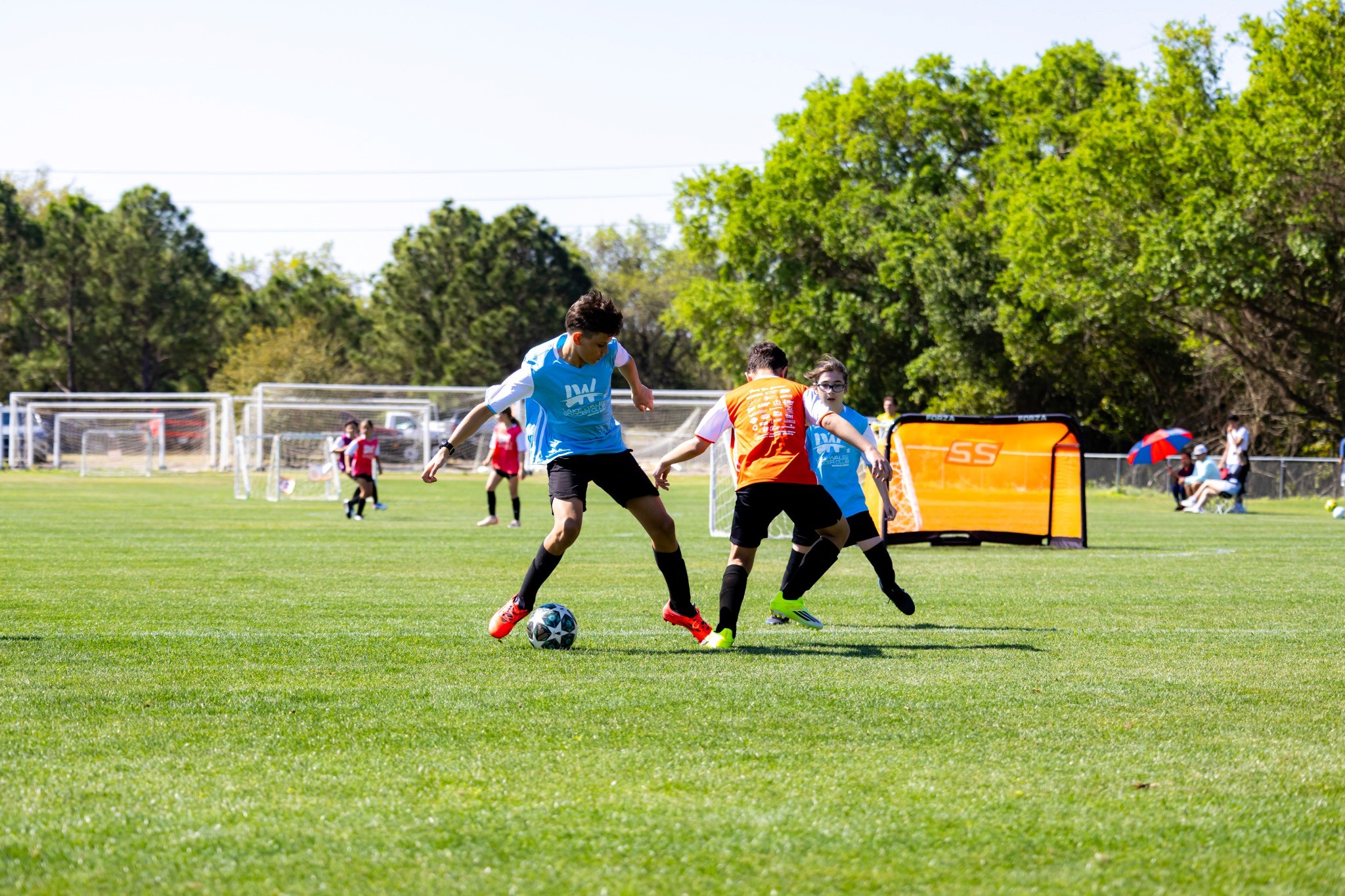 Lake Wales Soccer Club older players competing