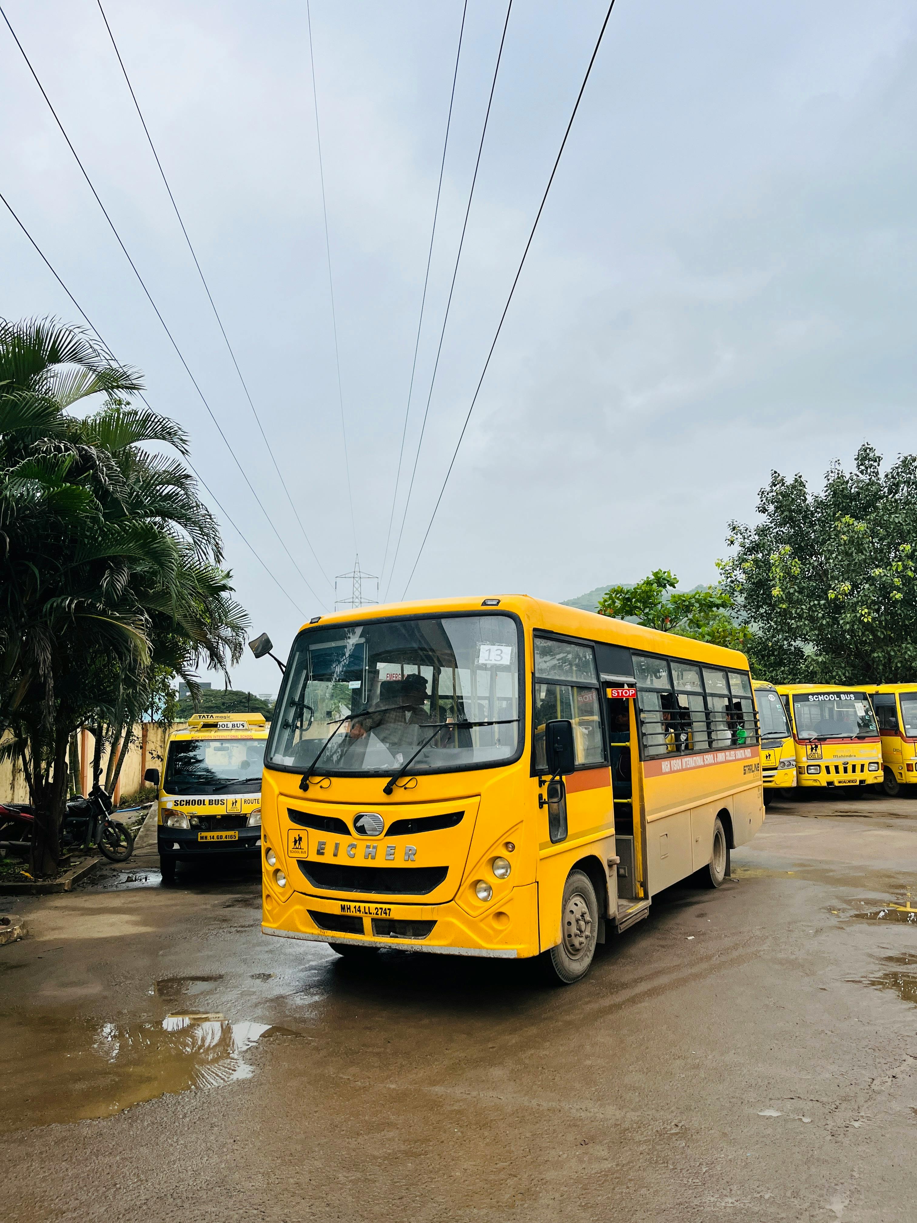 yellow school bus on road during daytime