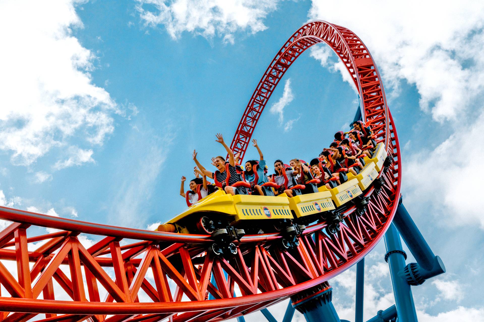 brown and white temple surrounded by green trees during daytime