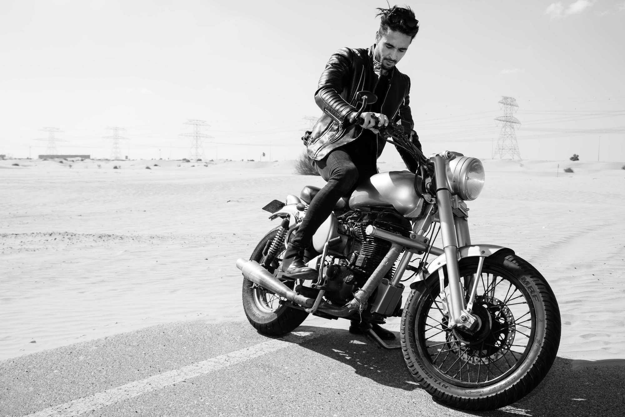 Black and white of a guy on a bike | Bonanza Satrangi’s: Perfume TV Commercial Production | Relity Group