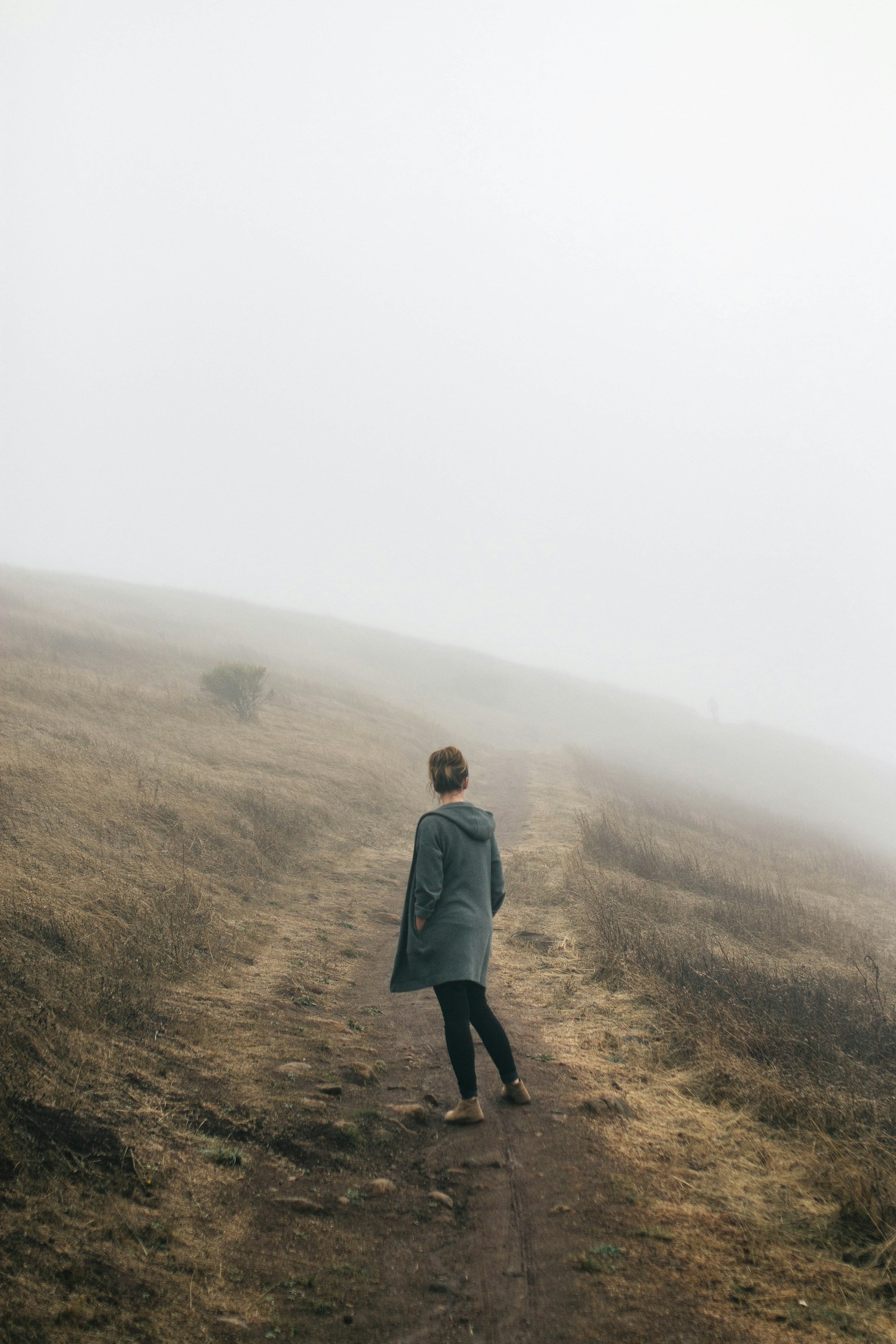 The hill path, in a green coat