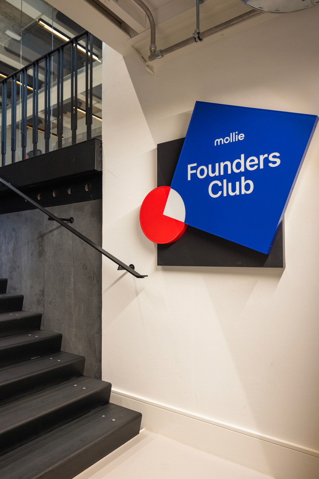 Mollie Payments founders club signage by Positive Space