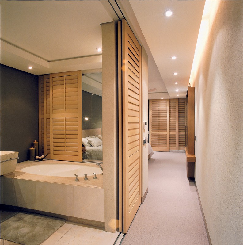 Full-height California Shutters are perfectly designed for room dividers