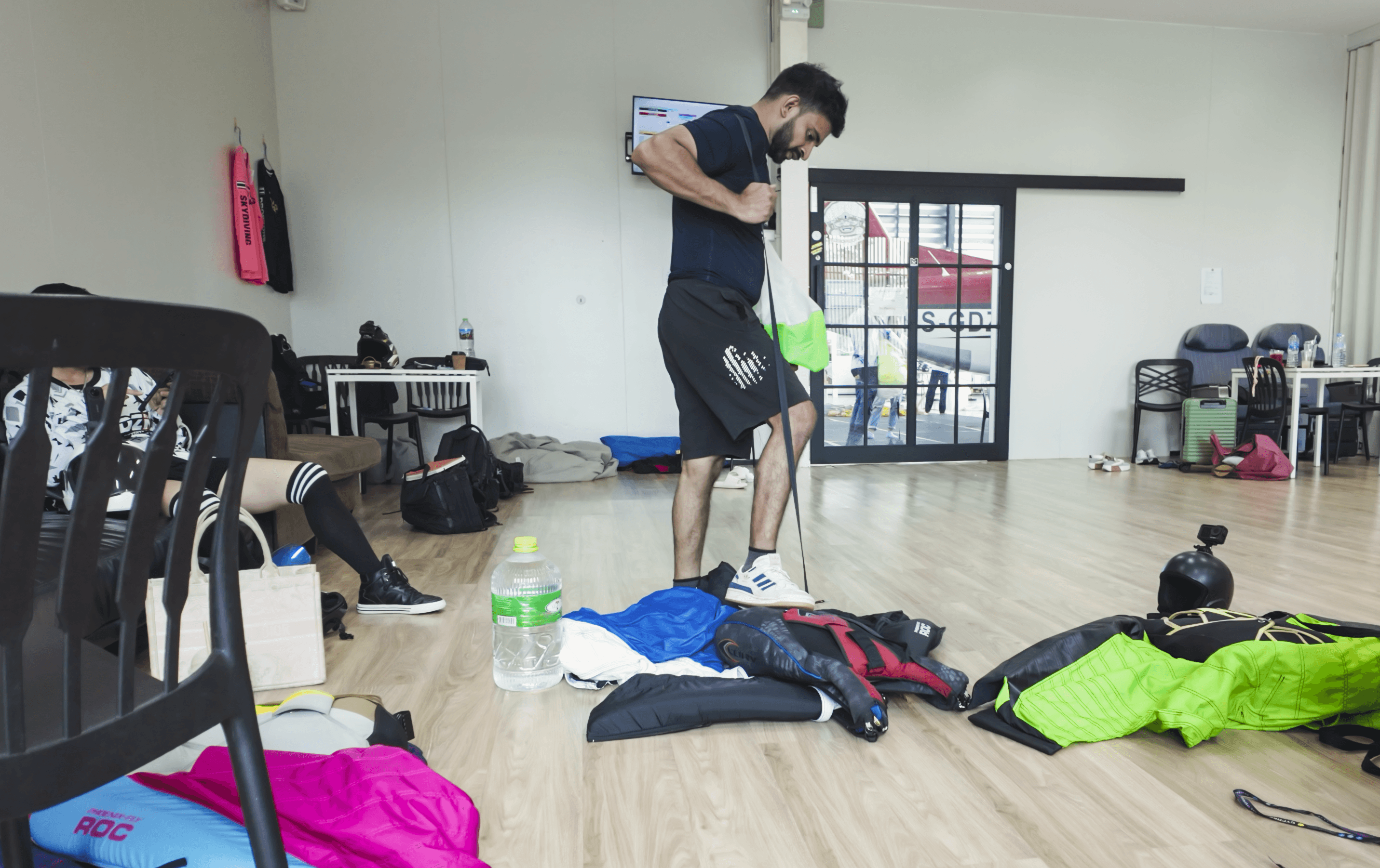 Skydiver packing their own parachute rig
