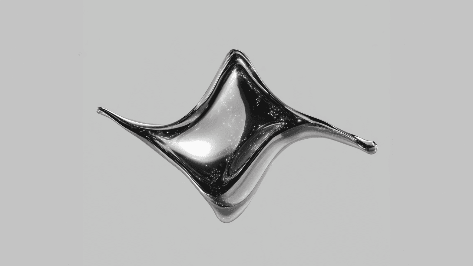 Two colleagues collaborating over paperwork at an office desk, with plants in the background.