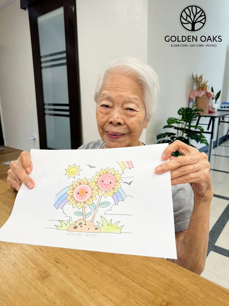 A female senior having fun colouring at Golden Oaks nursing home.