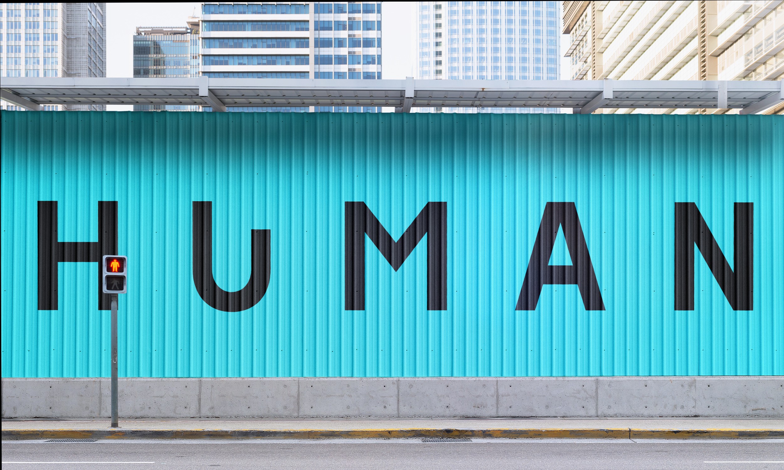 Wordmark on landscape city street wall