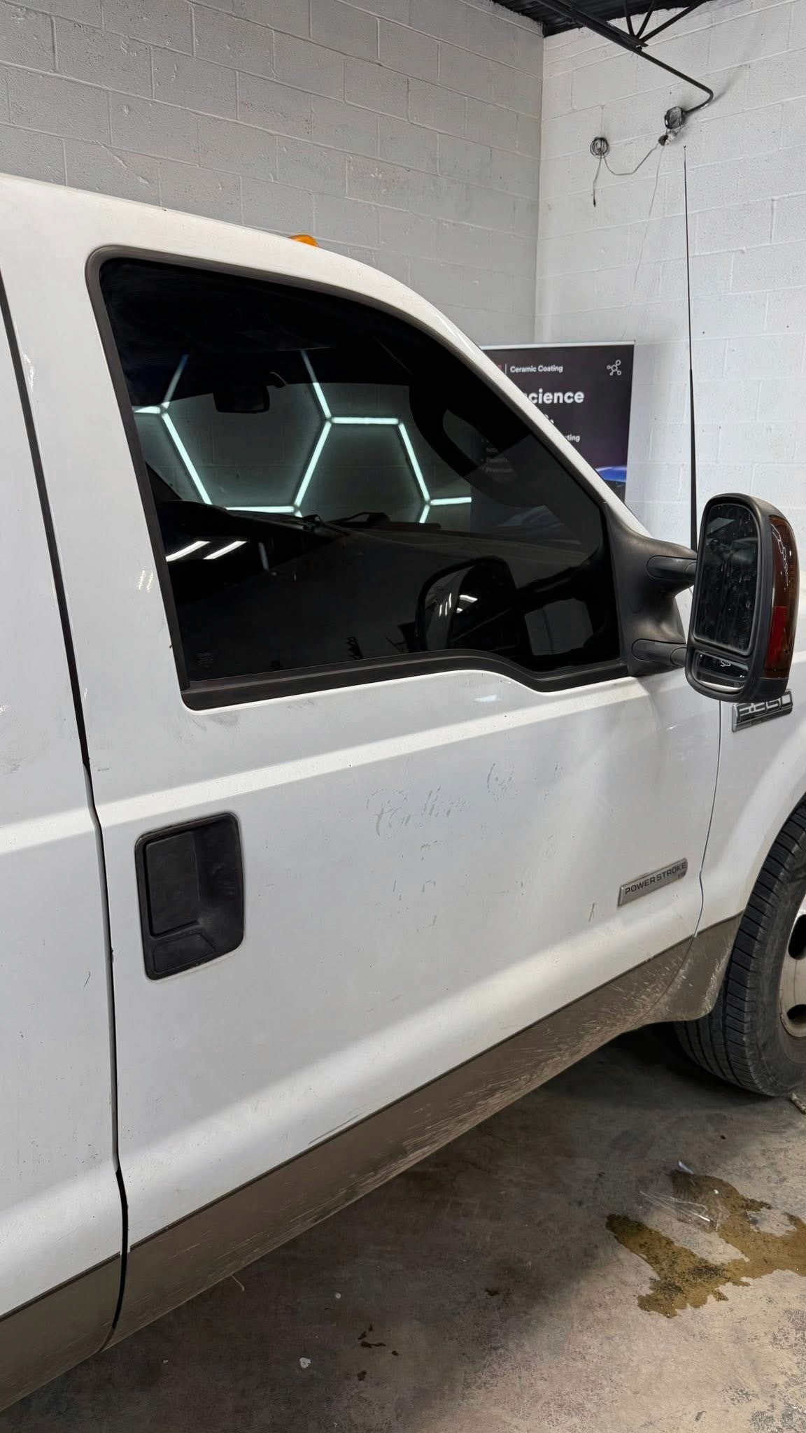 Shiny white car in a garage 