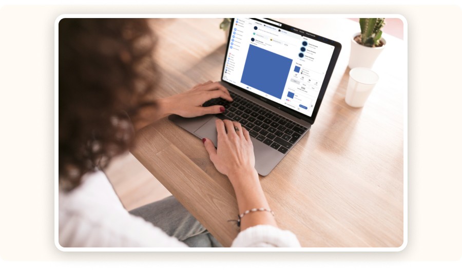 Woman posting on Facebook