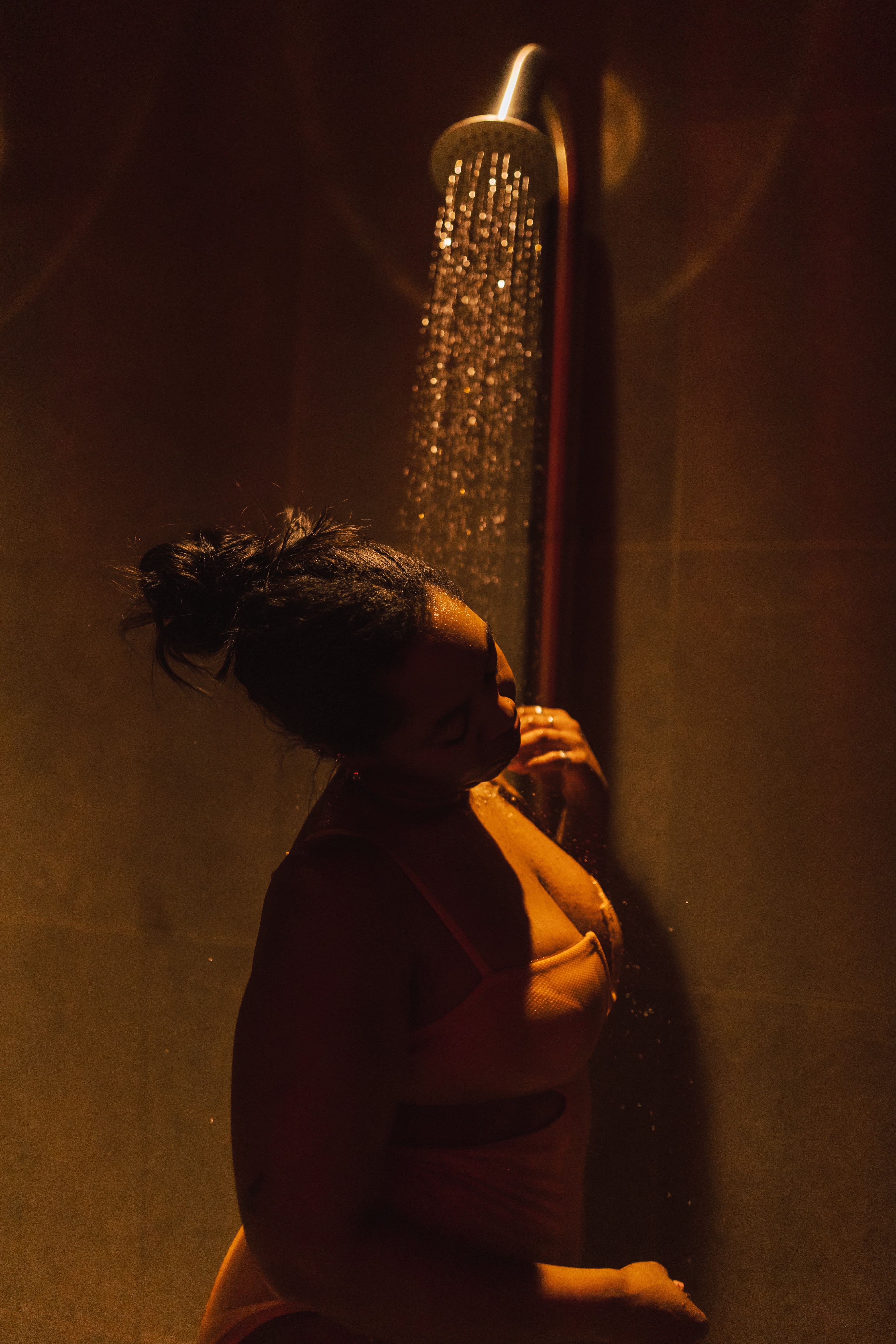 A person browsing a retreat website on a laptop in a cozy space, soft morning light, plant decor, clean modern aesthetic, sense of curiosity and exploration.