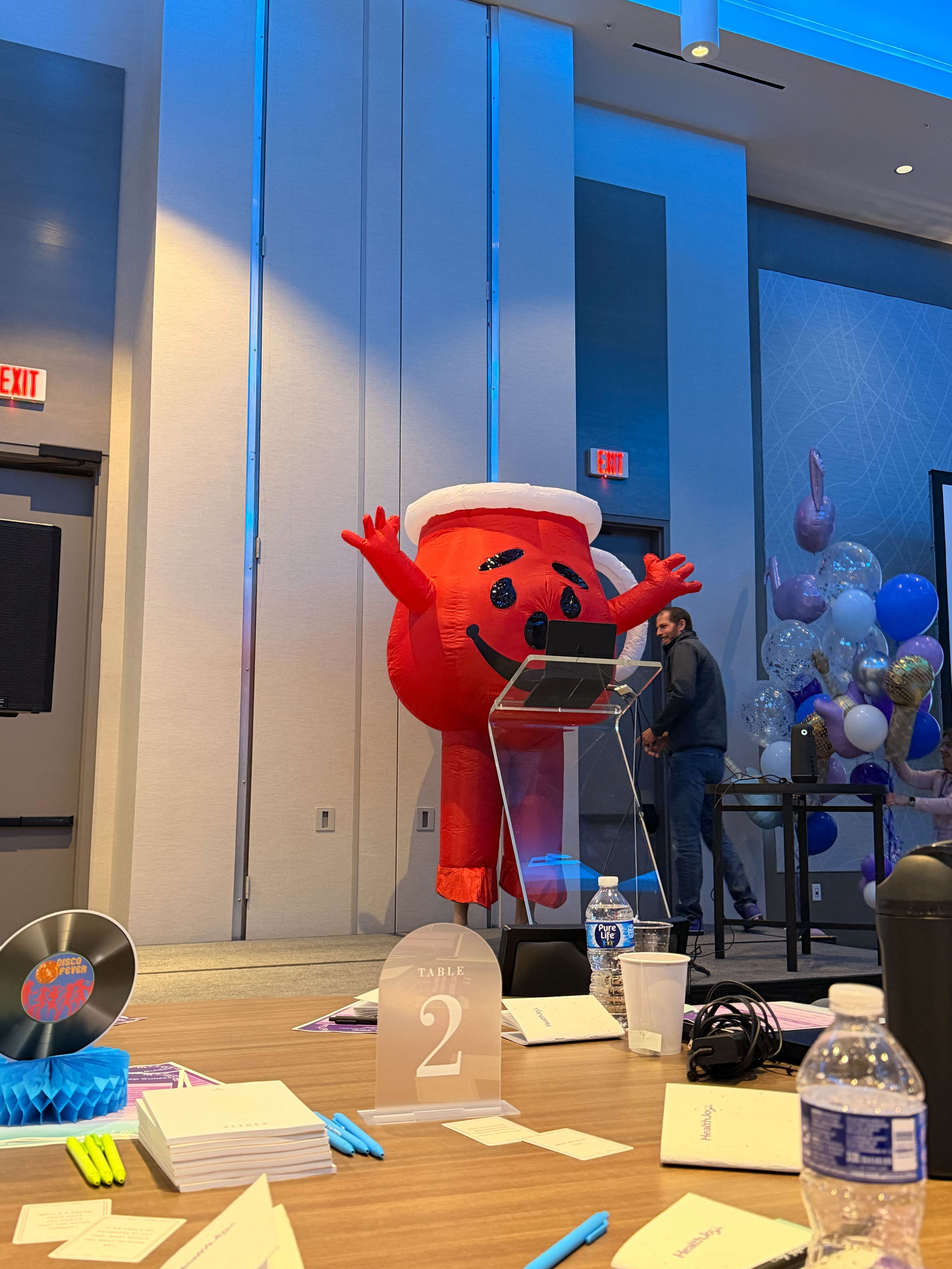 HealthJoy team event with a costumed mascot.