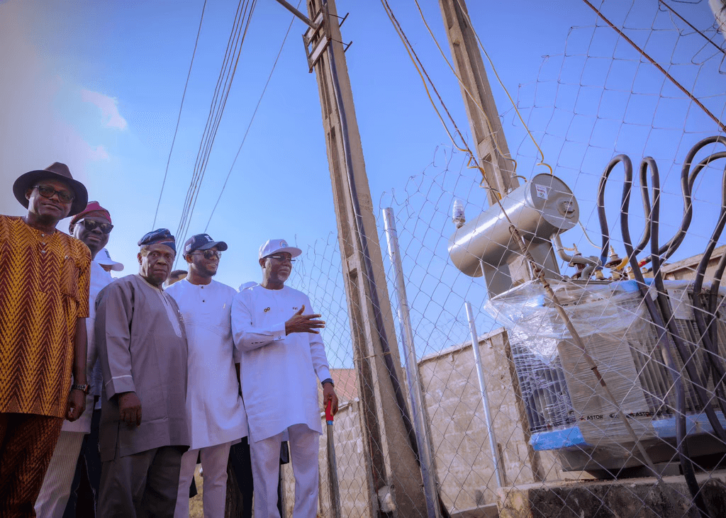 Two professionals in discussion, presenting ideas for brand identity design.